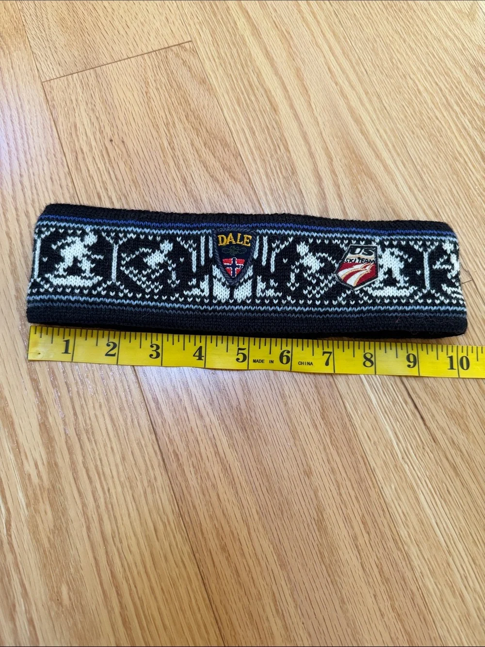 Dale of Norway nordic pattern wool headband with US Ski team logo .